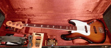 Load image into Gallery viewer, Fender USA 1975 Jazz Bass Reissue Sunburst with case + candy used
