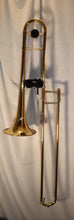 Load image into Gallery viewer, Unbranded Student Trombone with case and 2 mouthpieces used
