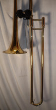 Load image into Gallery viewer, Unbranded Student Trombone with case and 2 mouthpieces used
