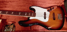 Load image into Gallery viewer, Fender USA 1975 Jazz Bass Reissue Sunburst with case + candy used
