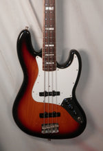 Load image into Gallery viewer, Fender USA 1975 Jazz Bass Reissue Sunburst with case + candy used
