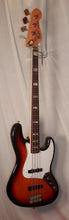 Load image into Gallery viewer, Fender USA 1975 Jazz Bass Reissue Sunburst with case + candy used
