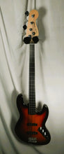 Load image into Gallery viewer, Squier Vintage Modified Jazz Bass Fretless Sunburst used
