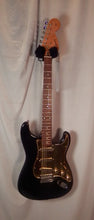 Load image into Gallery viewer, Squier by Fender Affinity Strat Black with Gold Pickguard electric guitar Alnico V Pickups used
